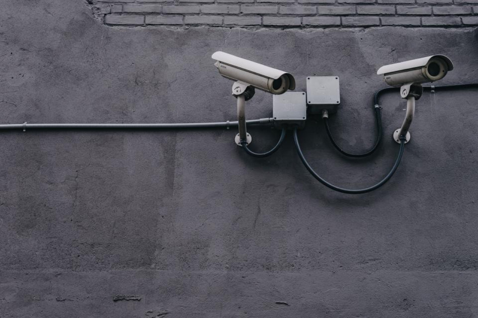 Security cameras mounted on a building wall