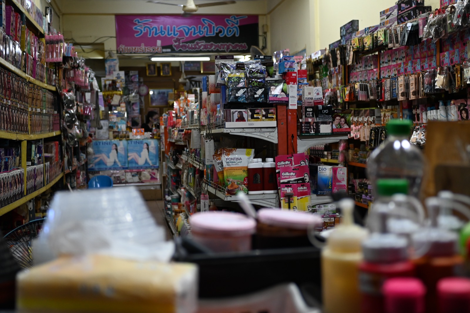 A retail checkout counter with a till