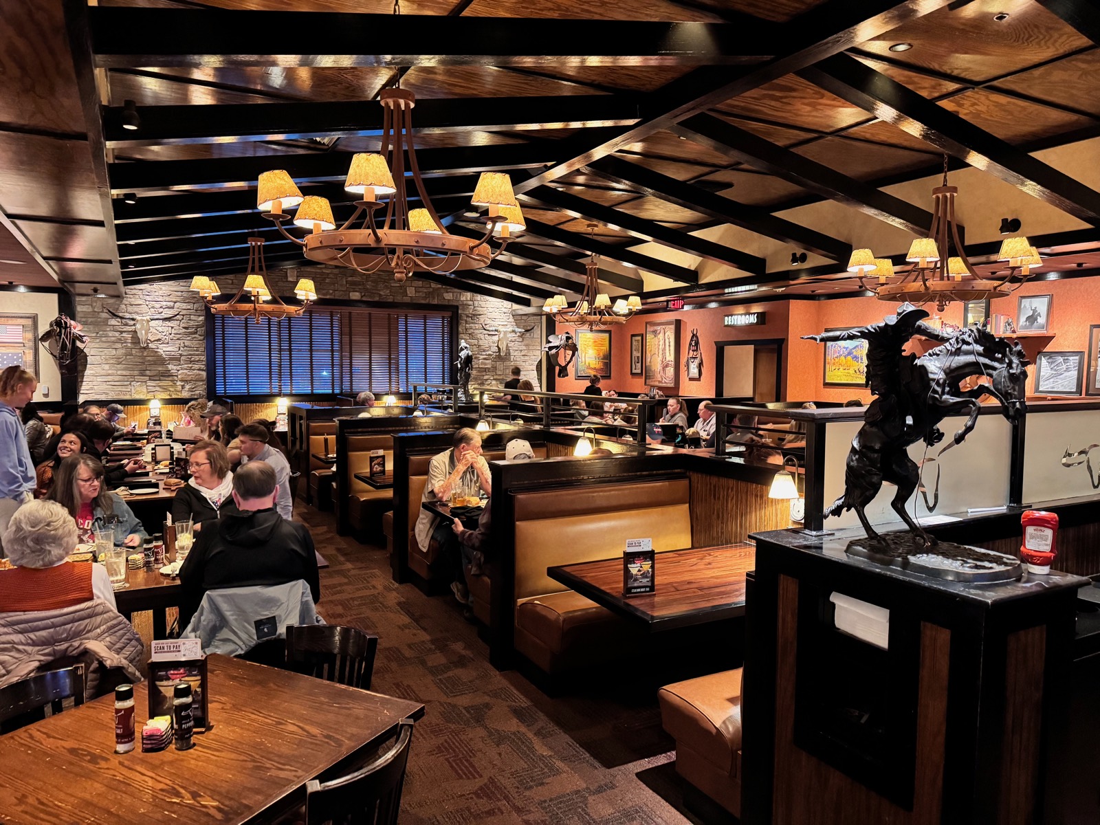 A restaurant dining room with laid tables